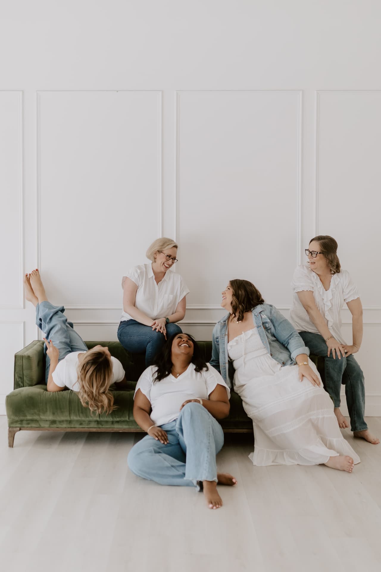 Five Jordan Consultants team members relaxing together